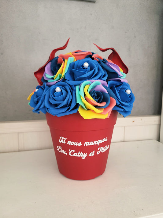 Pots funairaire avec des fleurs multicoleurs